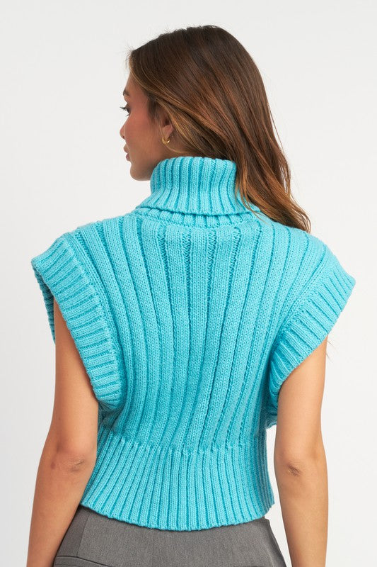 “CASSANDRA” RIBBED TURTLE NECK VEST