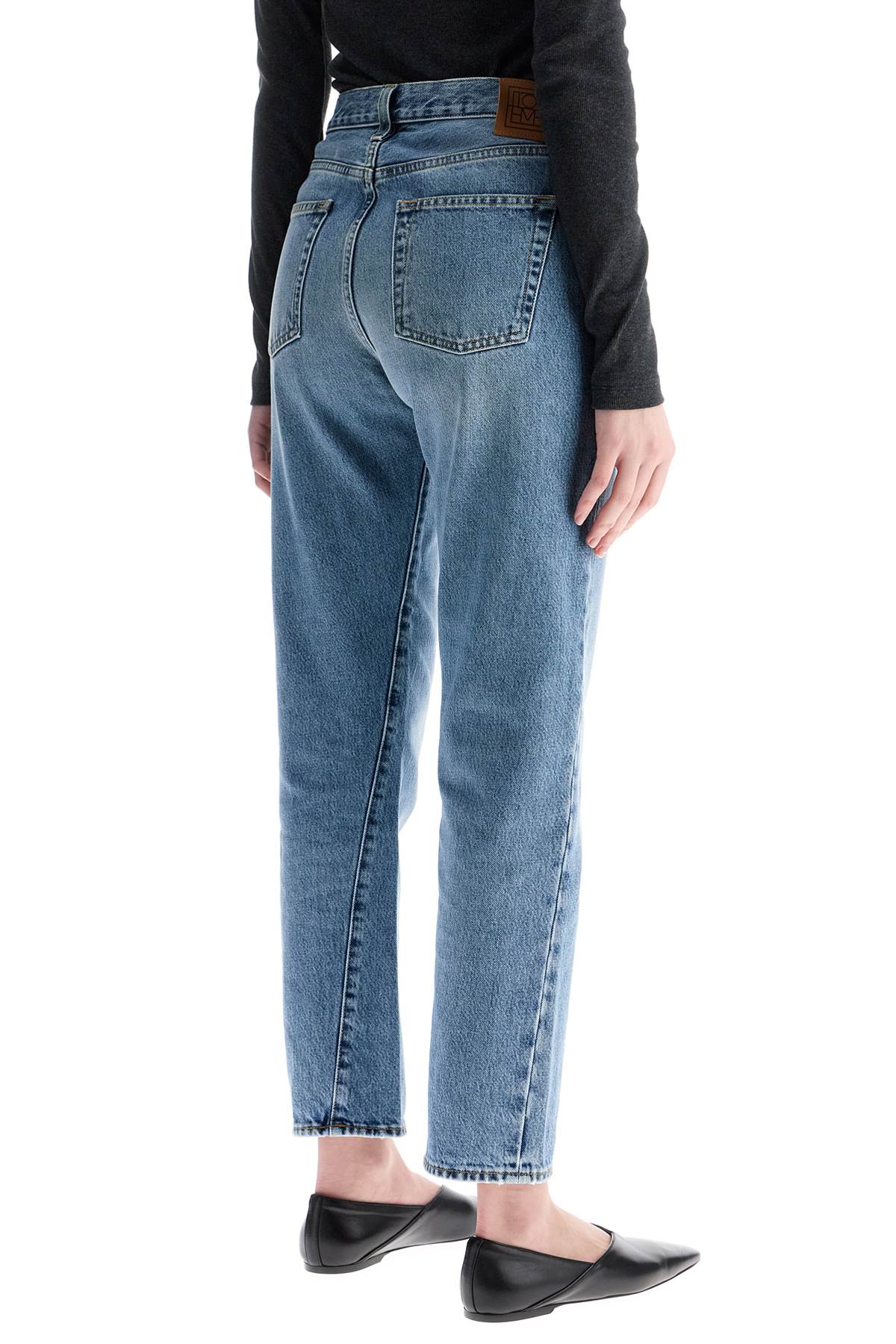 Toteme Toteme worn blue organic cotton jeans with twisted seams