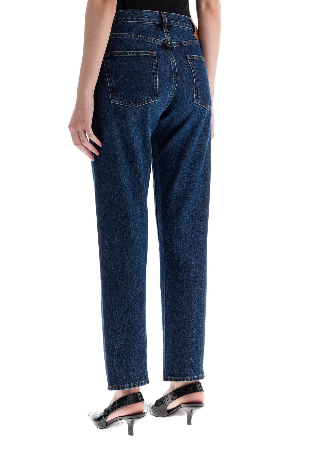 Toteme Toteme dark blue organic cotton jeans with twisted seams