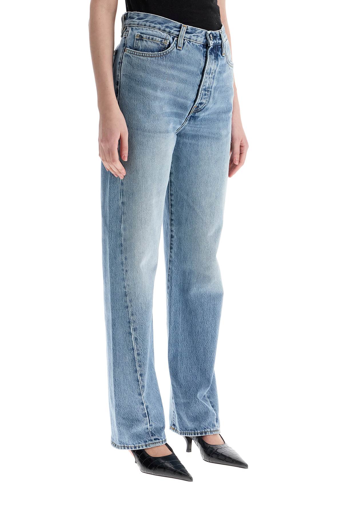 Toteme wide leg organic cotton jeans in worn blue with twisted seams