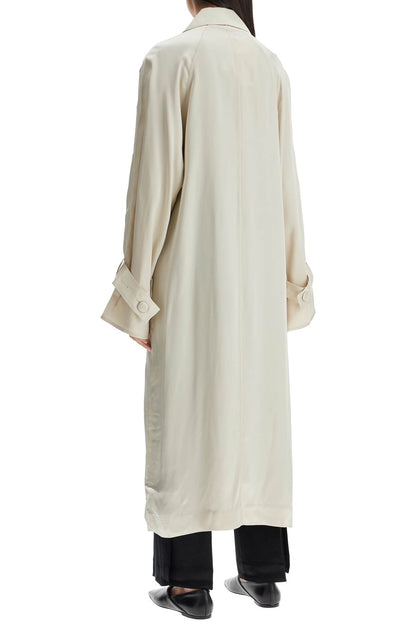 Toteme Toteme long white satin trench dress in viscose