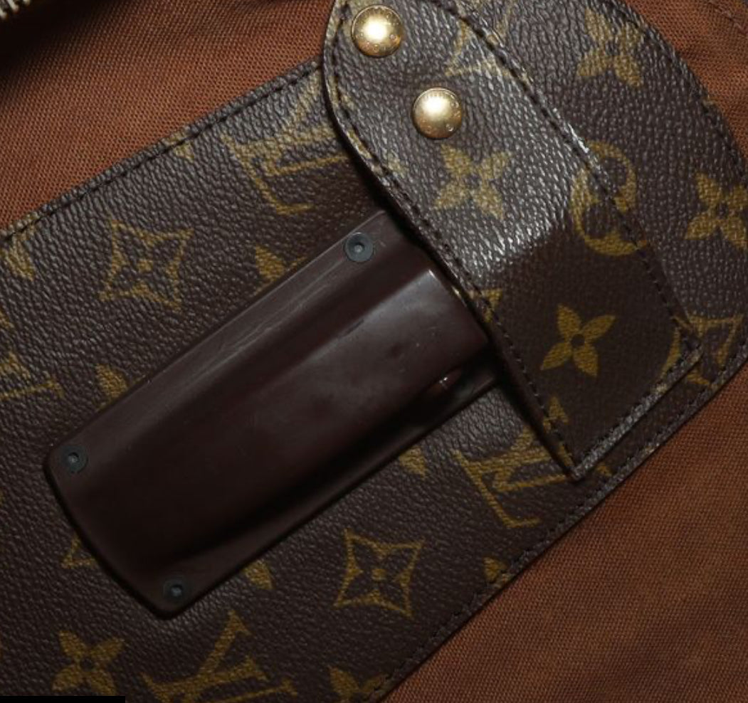 LOUIS VUITTON - 
LOUIS VUITTON Monogram Sybilla Shopping In The Rain Backpack