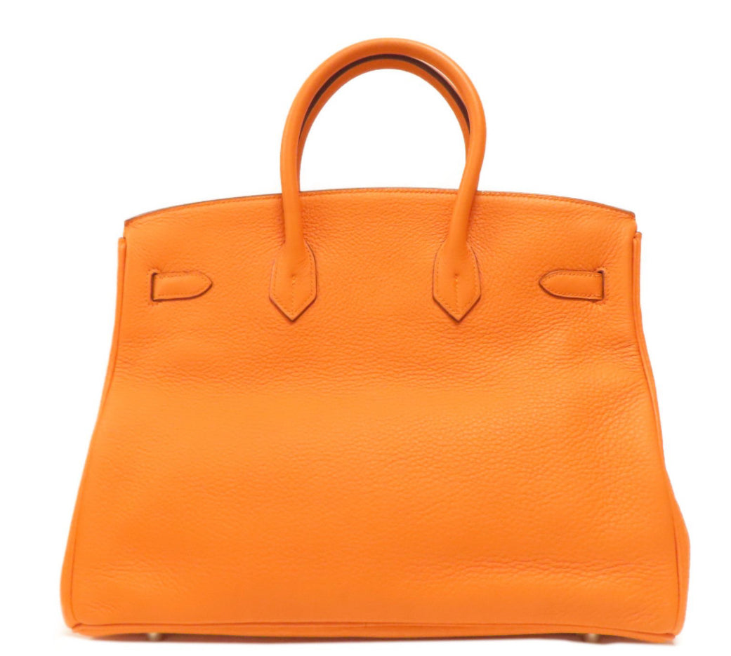 HERMÈS 
Taurillon Clemence Birkin 35 Orange (pre-loved)