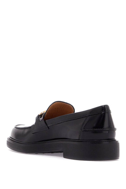 Tod'S Tod'S metal logo loafers with metal detailing